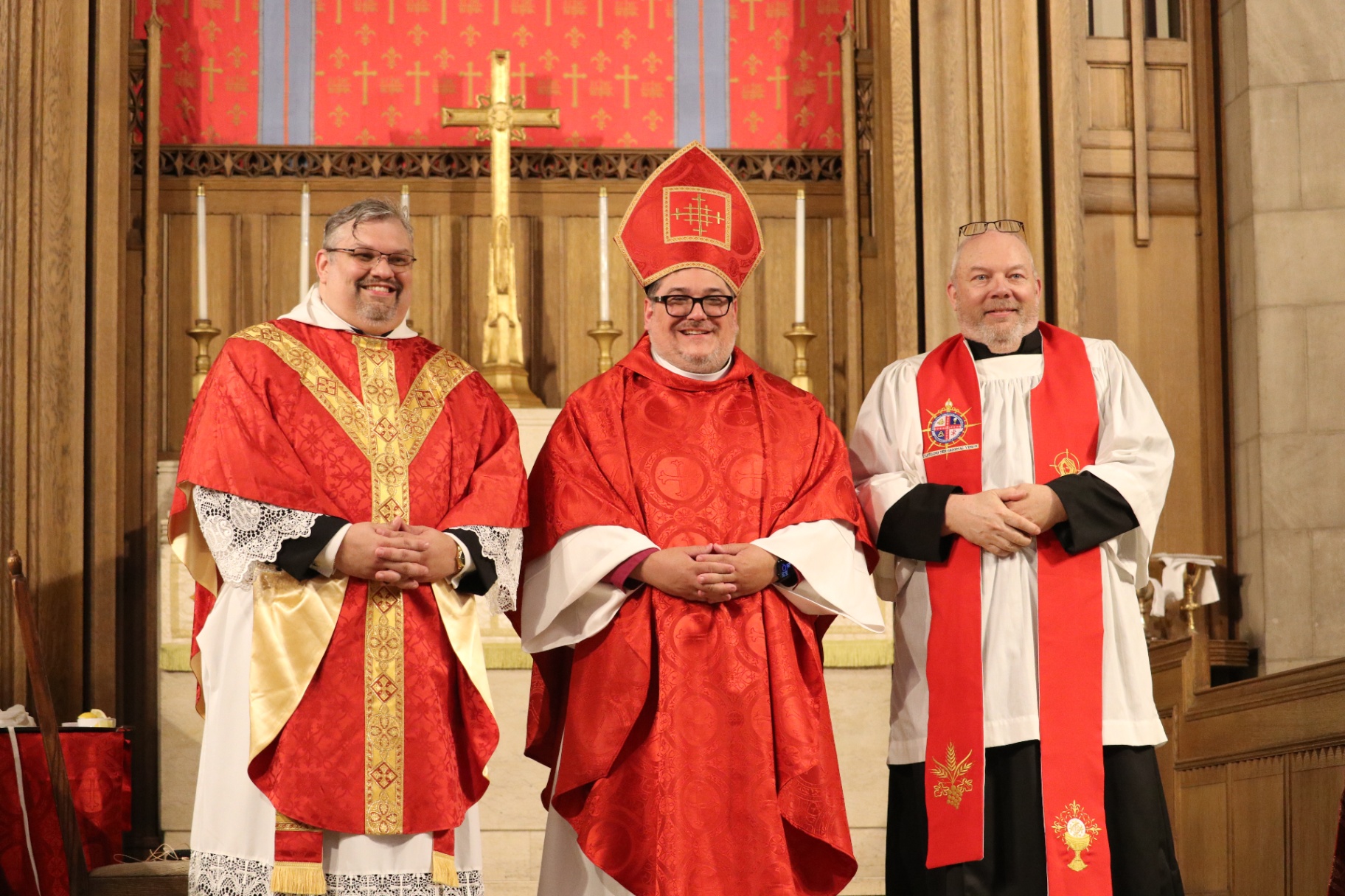 Bishop Whetstone with the newly ordained Fr. Liam Helms and Bishop Elect Kenneth Nelan of the Anglican Diocese of Keystone at the altar.